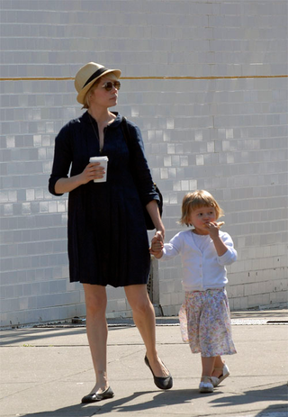 Illustration for article titled Brad Bikes; Aniston Oils Up; Michelle & Matilda Soak Up The Spring Sun